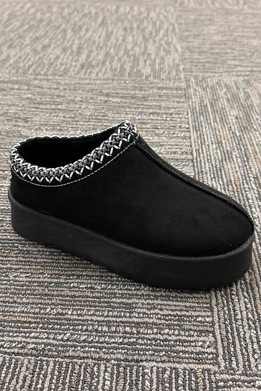 Black suede clogs