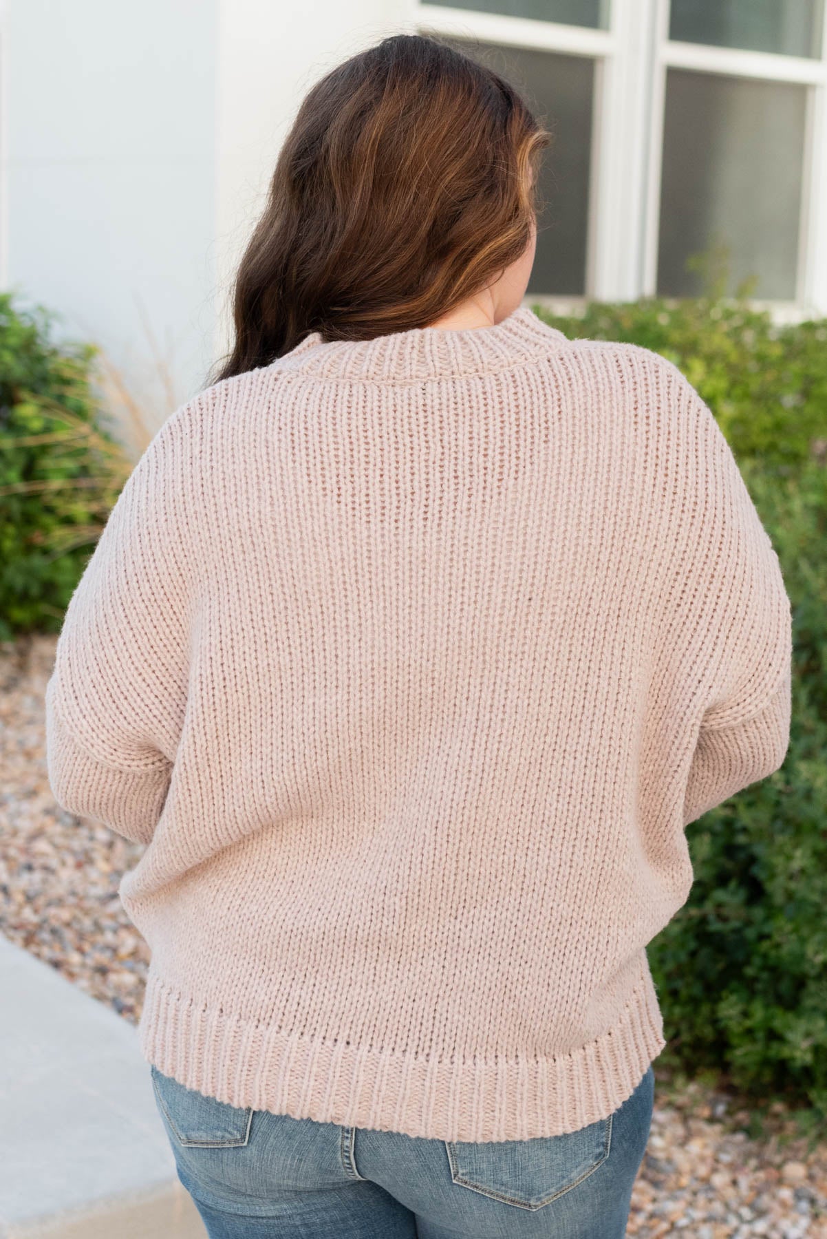 Back view of the plus size natural flower sweater