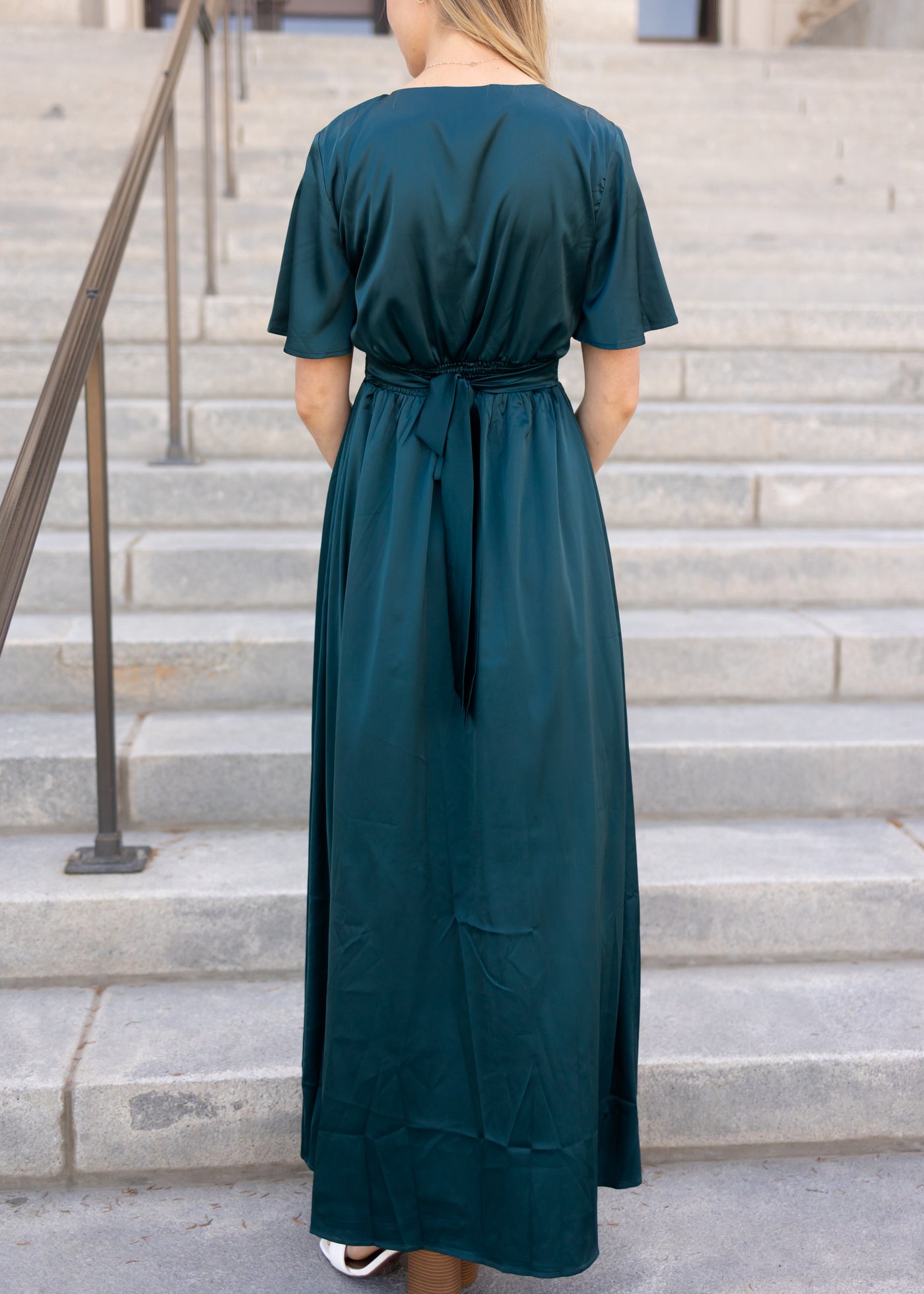 Back view of a teal dress