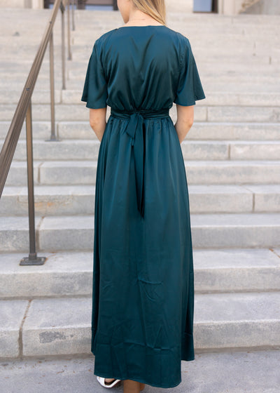 Back view of a teal dress