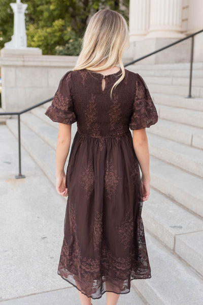 Back view of the brown embroidered dress