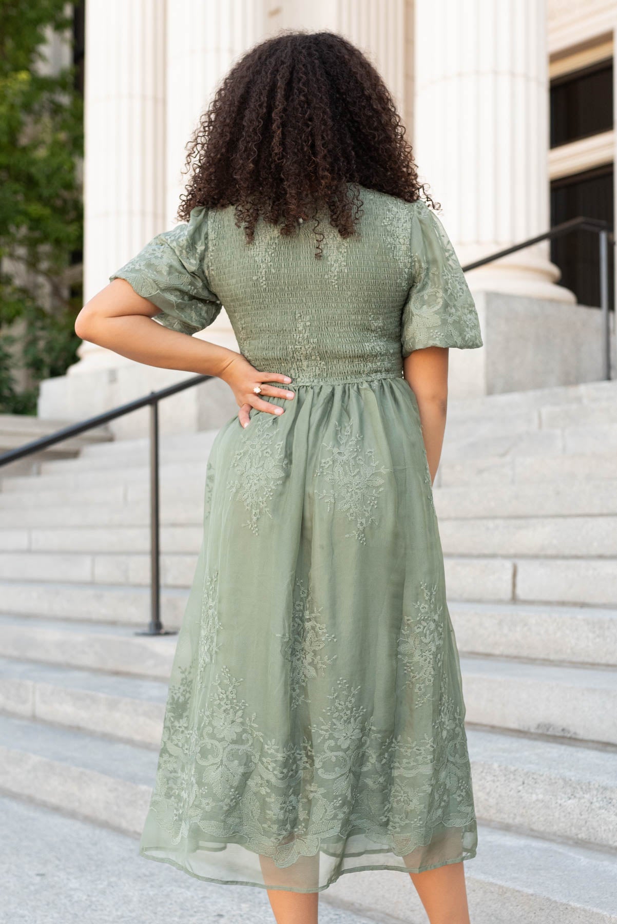 Back view of the deep sage embrodered dress