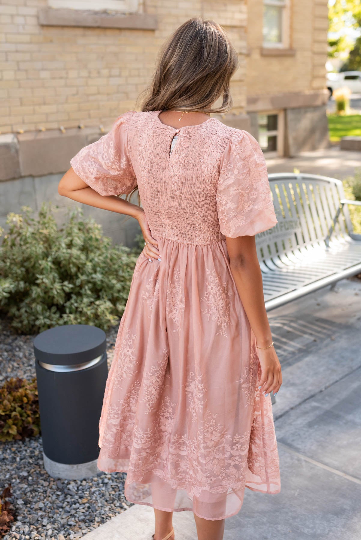 Back view of the dusty pink embroidered dress