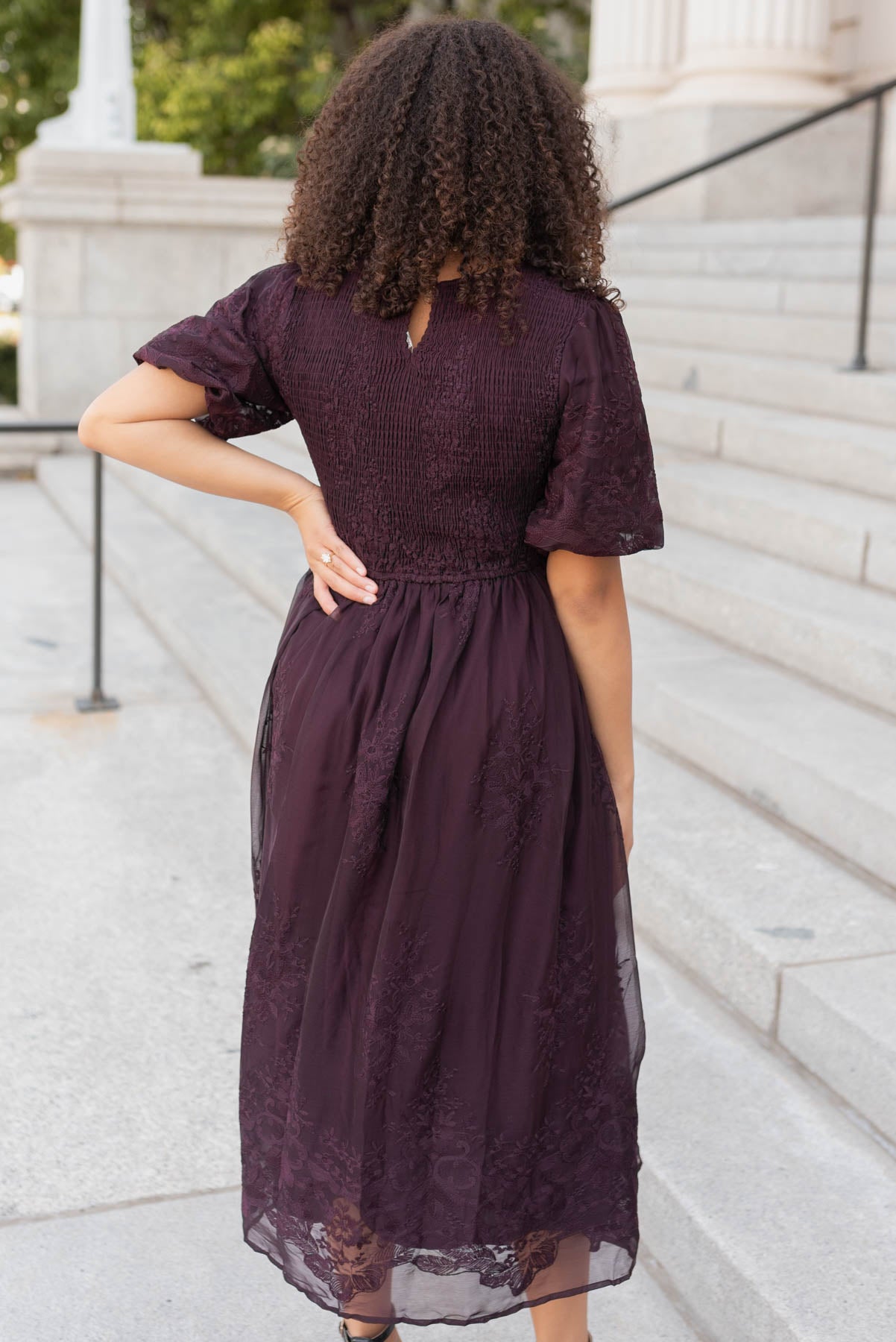 Back view of the plum embroidered dress