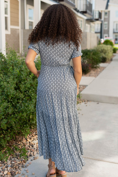 Back view of the navy pattern tiered dress