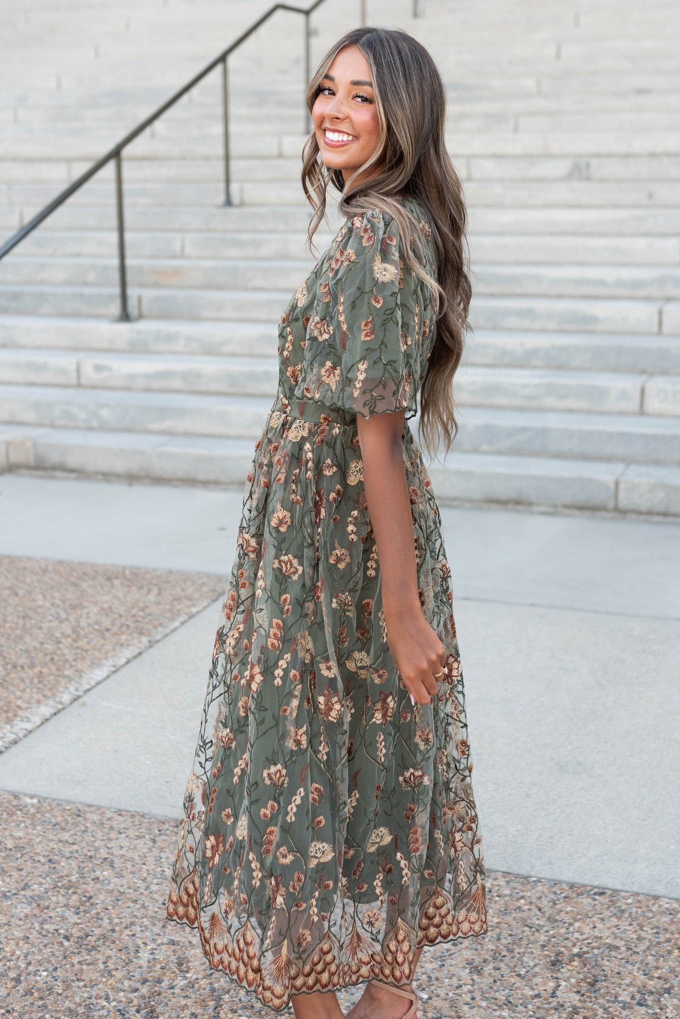 Side view of the olive embroidered dress