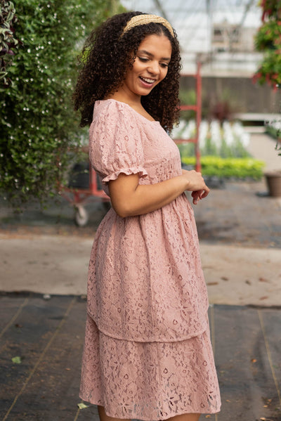 Side view of the dusty pink lace tiered dress