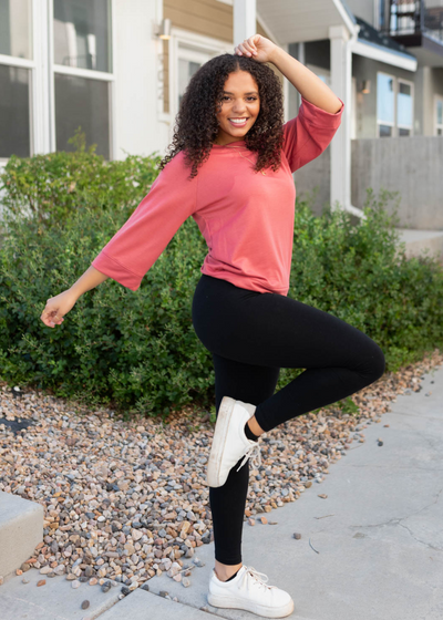 Side view of the terracotta pullover