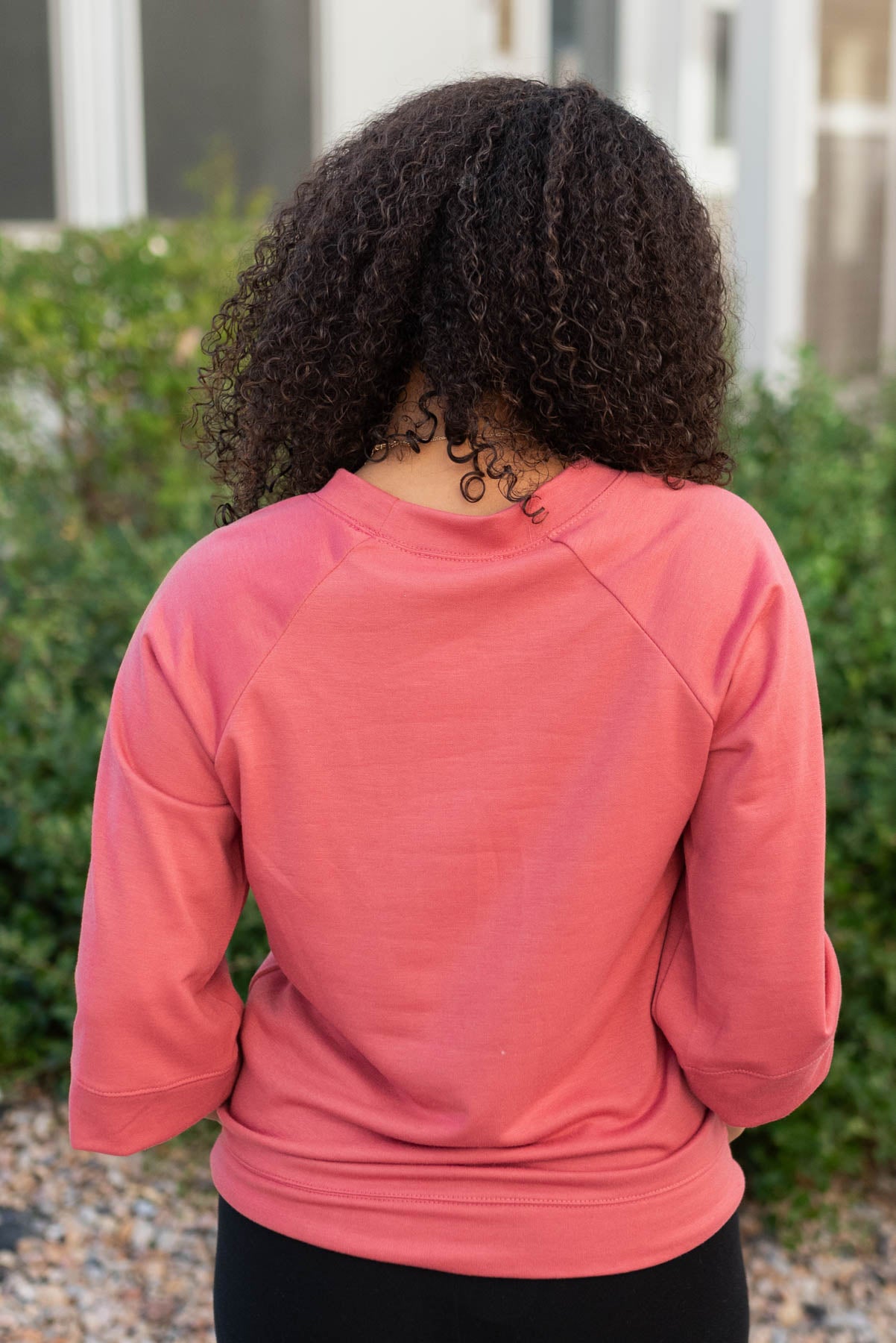 Back view of the terracotta pullover