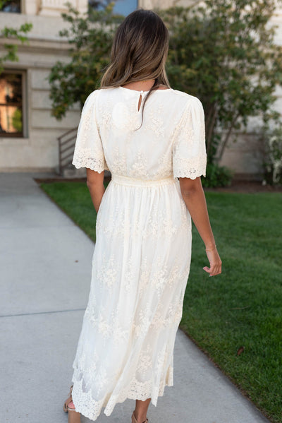 Back view of the cream lace embroidered dress