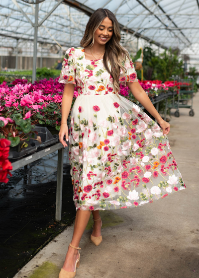 Magenta floral embroidered mesh dress with a round neck