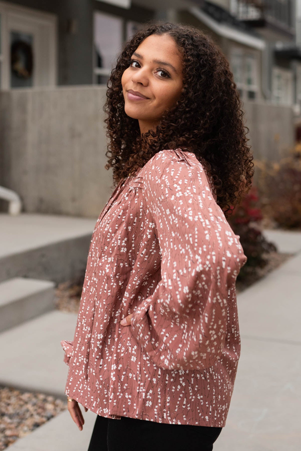 Side view of the marsala floral blouse