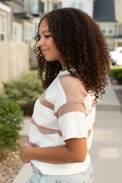 Side view of the khaki stripe knit top