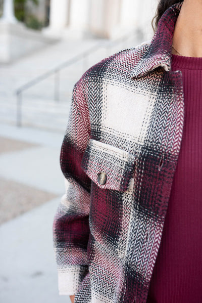 Close up of the burgundy pattern shacket