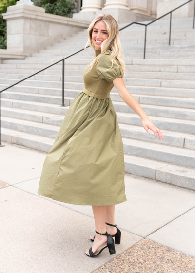 Side view of the olive knit bodice dress