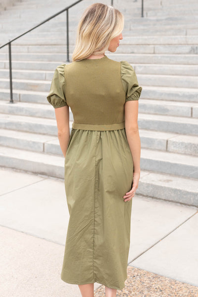 Back view of the olive knit bodice dress