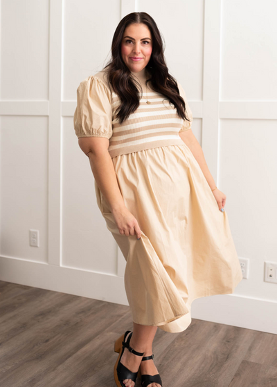 Plus size sand stipe knit dress with stripes on bodice