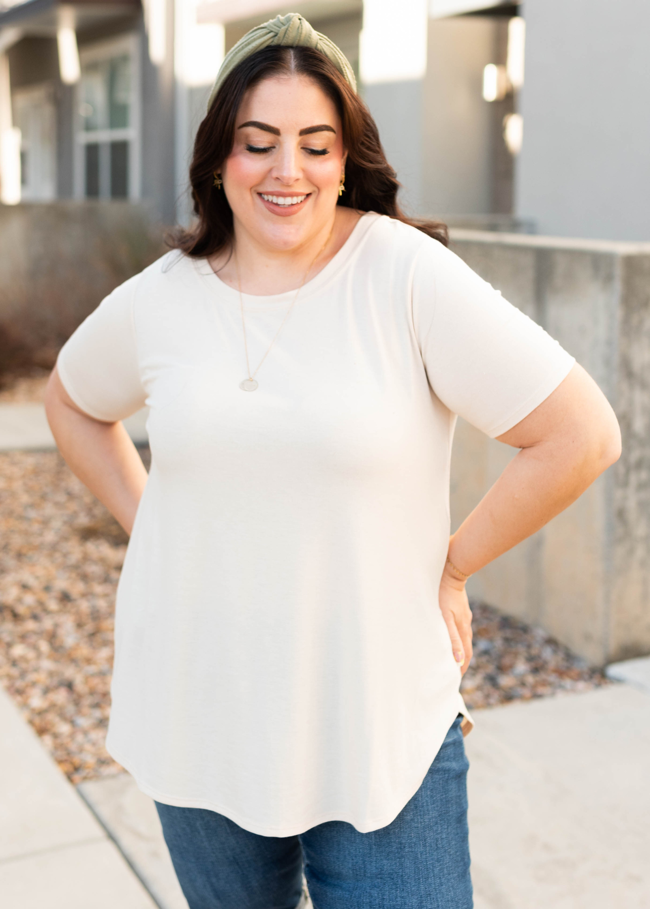 Front view of the plus size taupe top