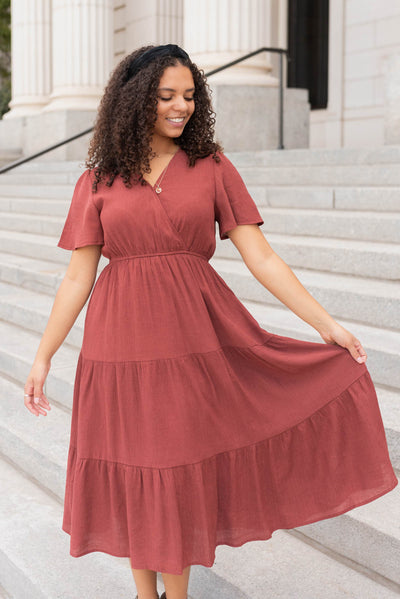 Terracotta tiered wrap dress with short sleeves