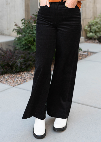 Wide leg black corduroy pants with pockets