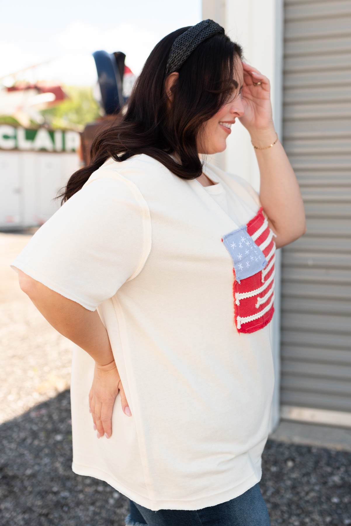 Side view of the ivory American flag patch top in plus size