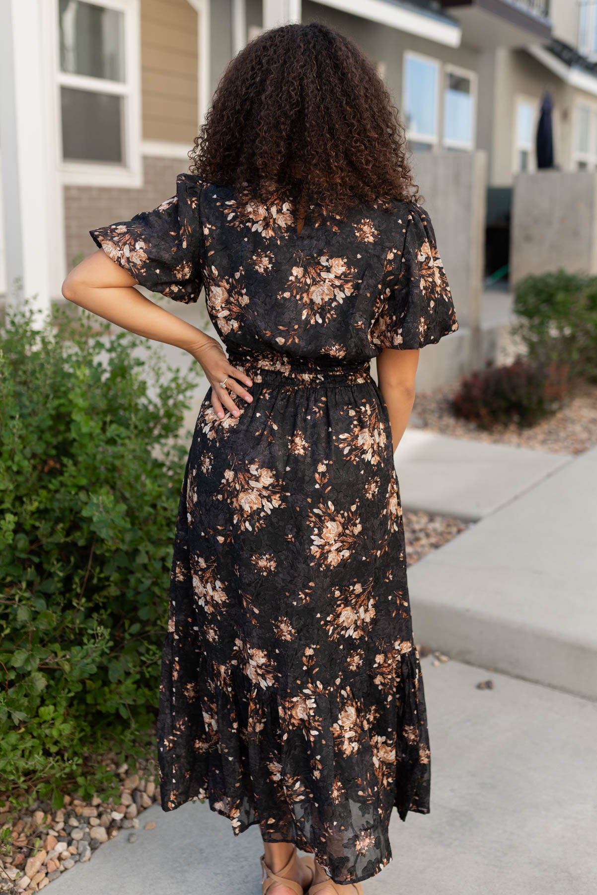 Back view of the black floral dress