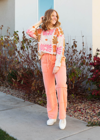 Cream floral sweater with long sleeves