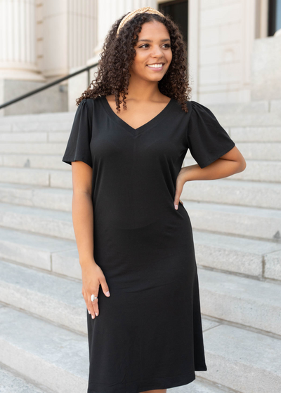 Black v-neck mini dress with short sleeves
