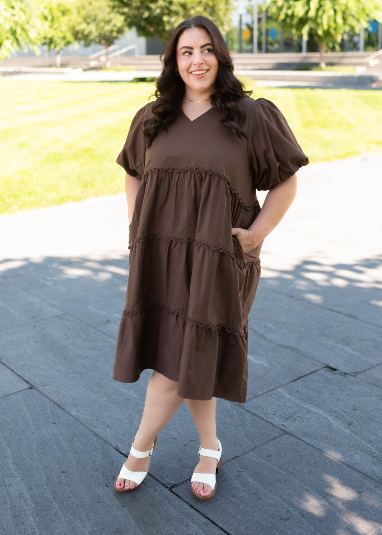 Plus size brown tiered dress with short puff sleeves