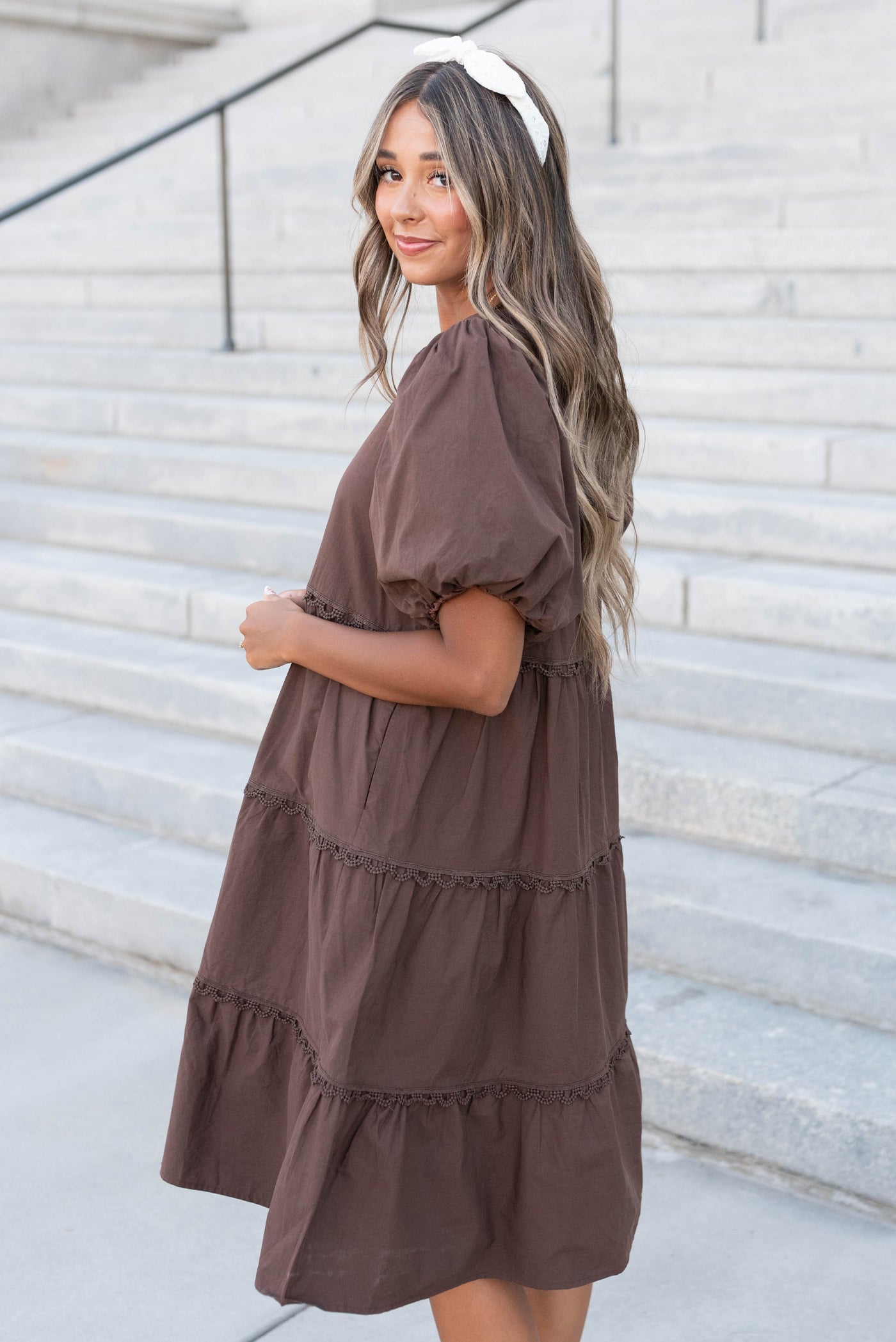 Side view of the brown tiered dress