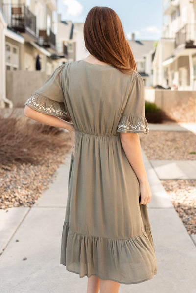 Back view of the sage embroidered dress