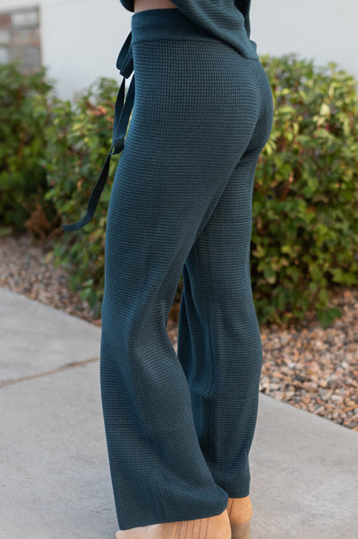 Side view of the navy pants