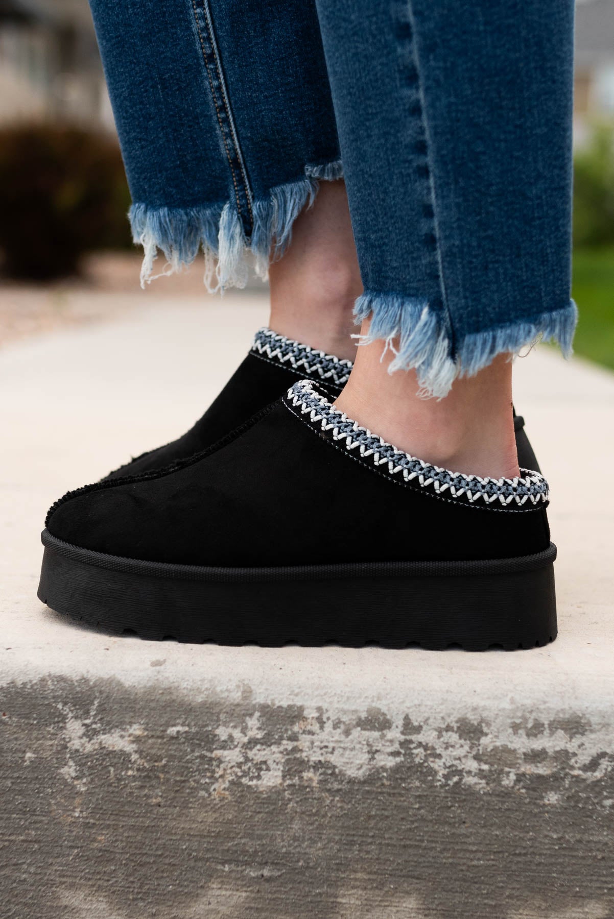 Black suede clogs