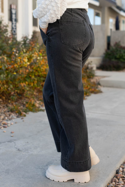 Side view of black wide leg pants