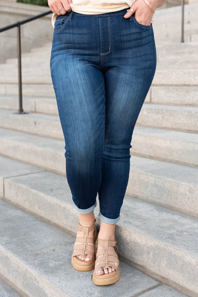 Front view of the dark mid rise jeans in plus size