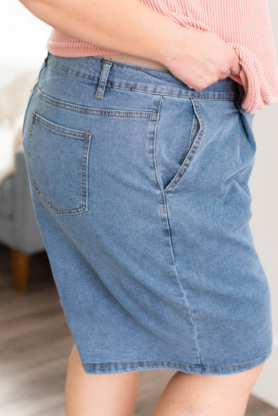 Side view of the plus size denim Bermuda shorts