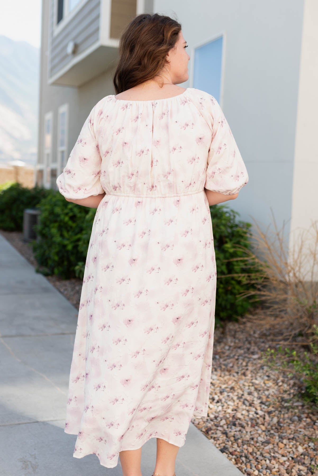 Back view of the plus size lavender blush floral dress