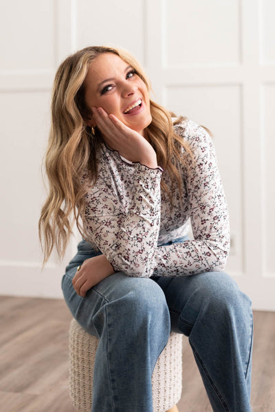 Burgundy flower print long sleeve top with burgundy trim