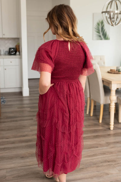 Back view of the burgundy smocked ruffle dress