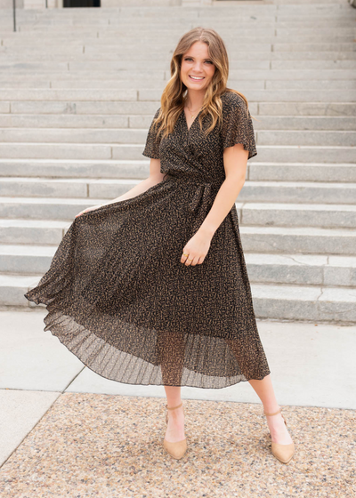 Lined black pleated dress