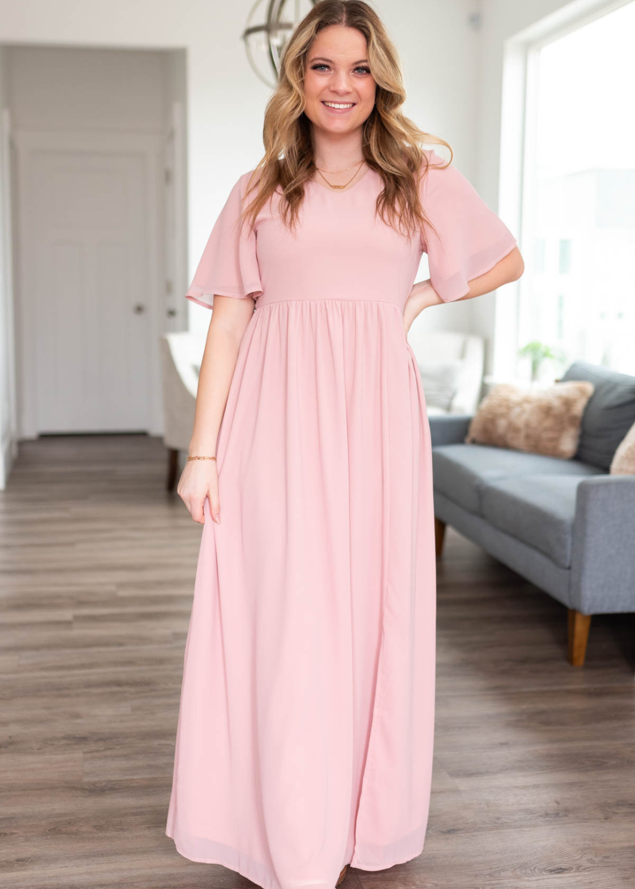 Long, high waisted blush chiffon dress with short sleeves