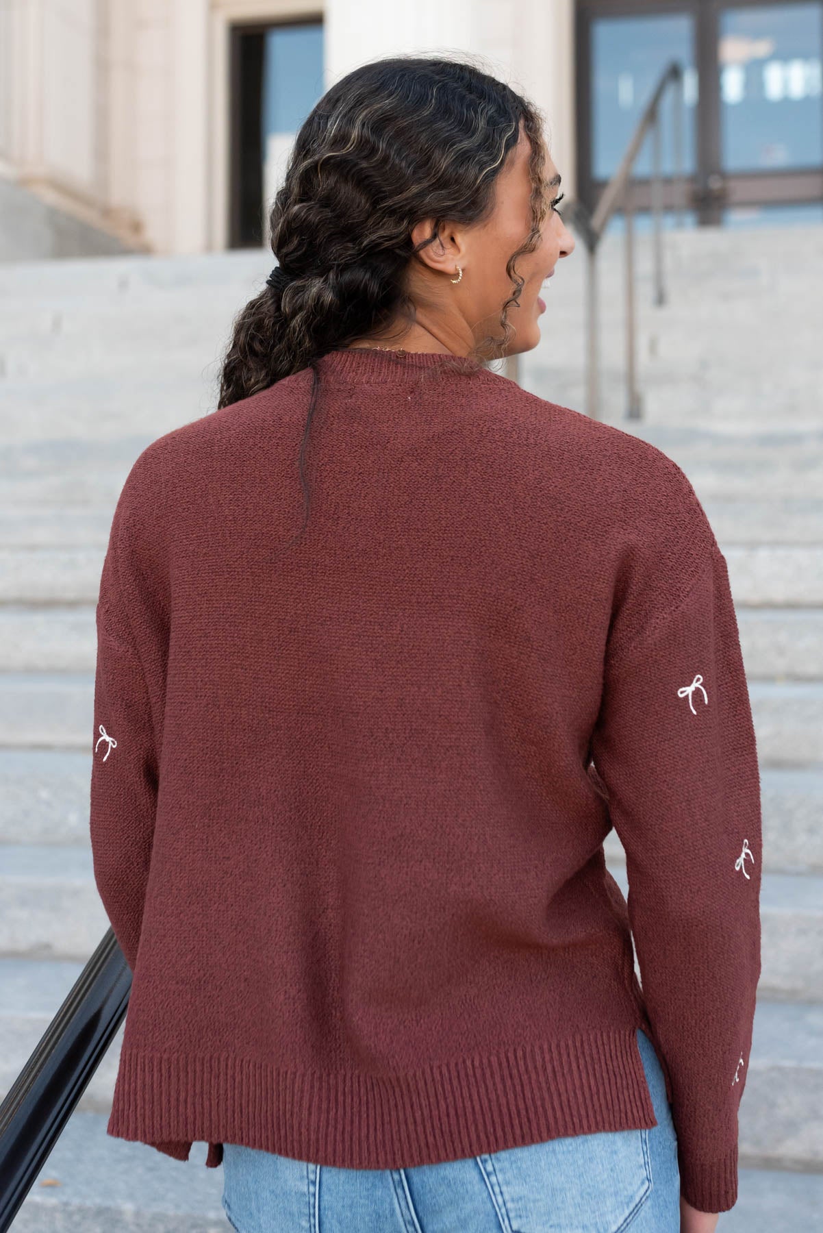 Back view of the sienna bow sweater