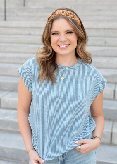 Dusty blue sleeveless ribbed top with capsleeves