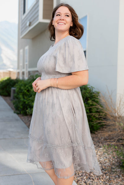 Side view of the grey floral lace dress