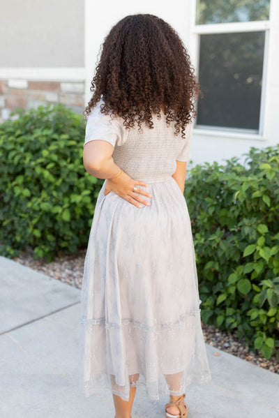 Back view of the grey floral lace dress