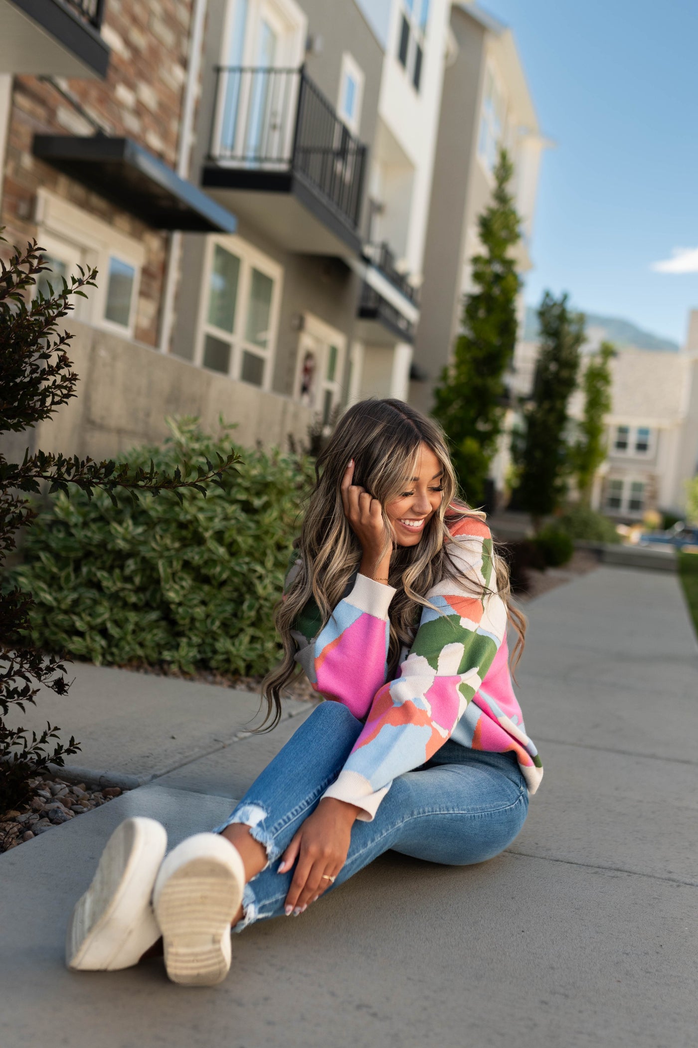 Medium wash jeans with frayed cuffs