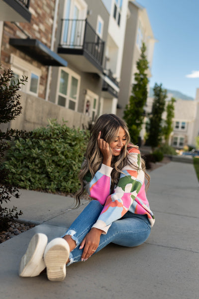 Medium wash jeans with frayed cuffs