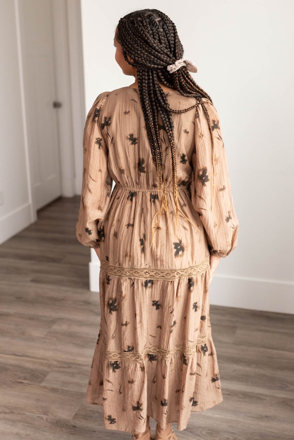 Back view of the mocha floral tiered dress