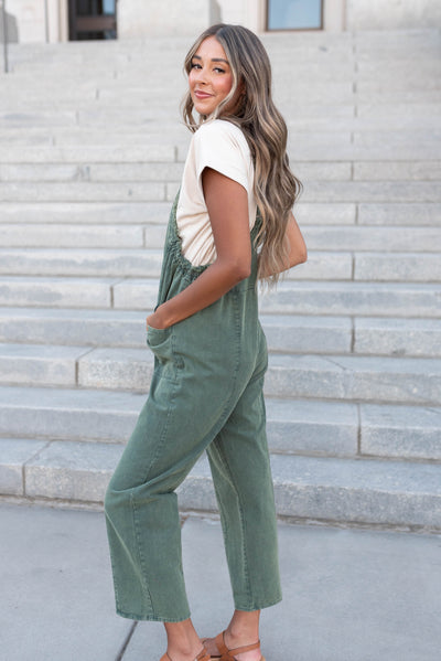 Side view of the hunter green washed jumpsuit