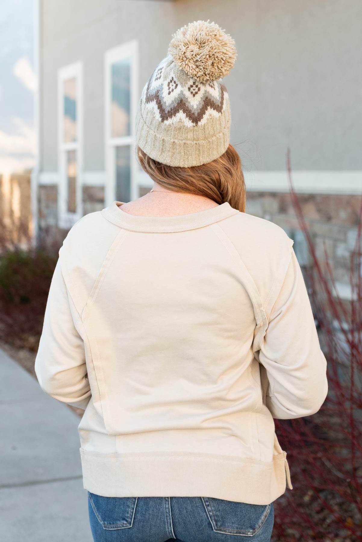 Back view of the taupe sweater